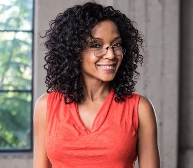 Woman wearing ThinOptics reading glasses looking stylish